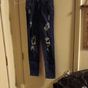 Distressed Blue Denim Jeans